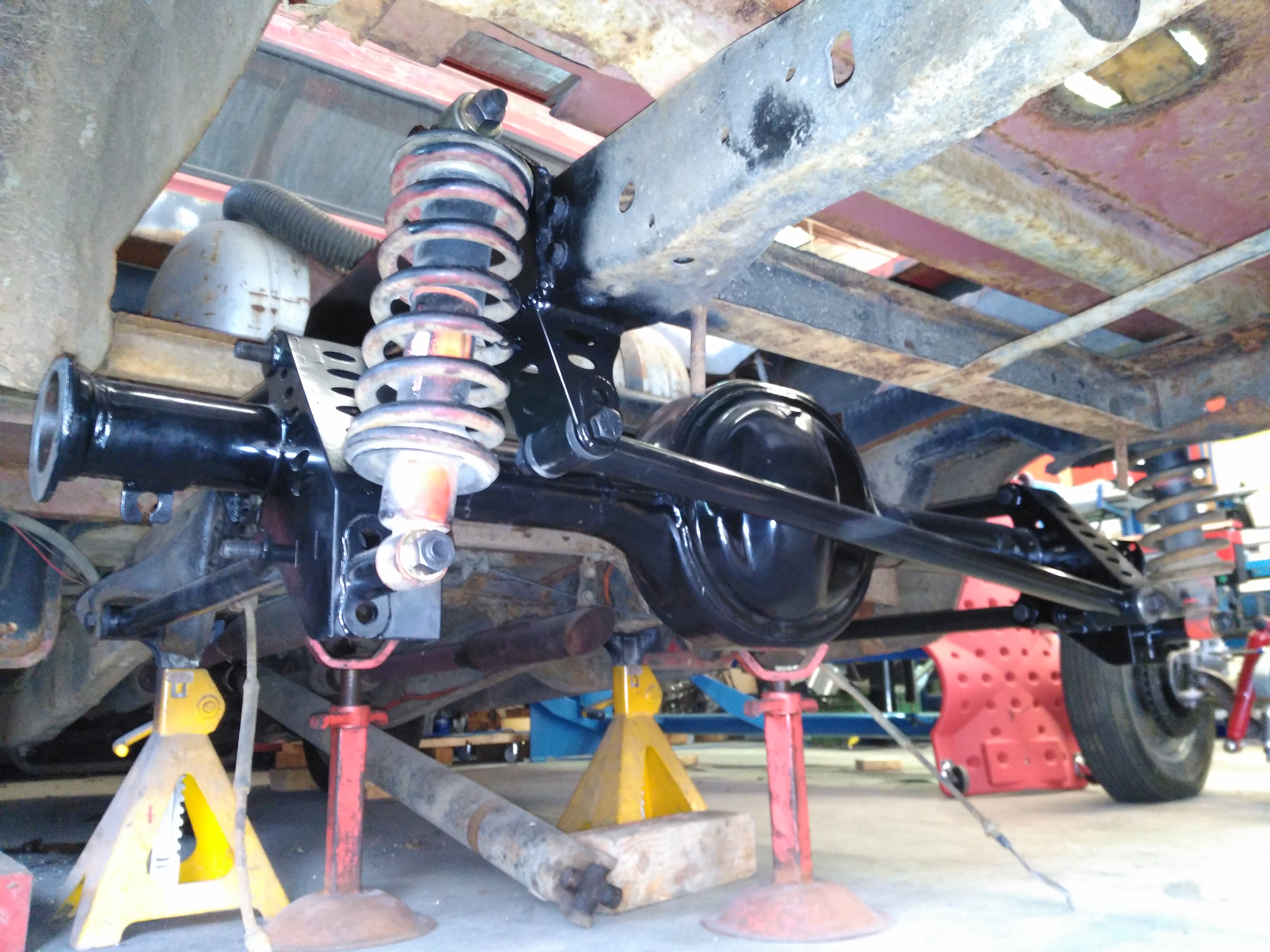 F100 rear 4 link, pan hard bar and coil overs with notched chassis